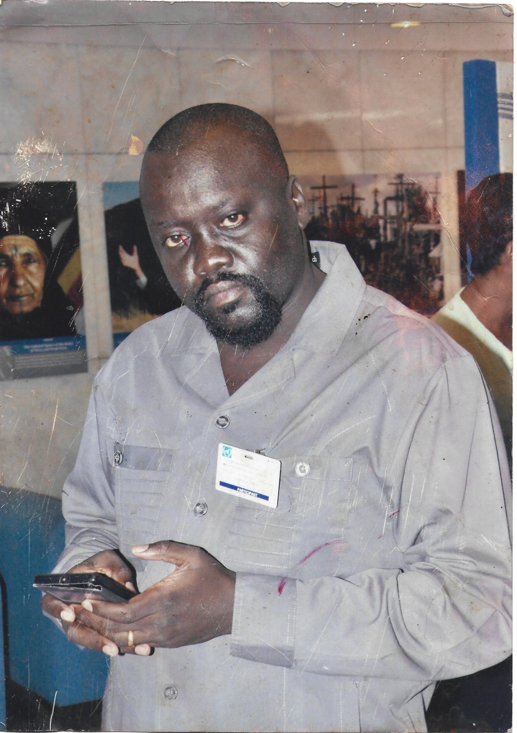 Labana wearing a participant badge during a workshop in Ethiopia