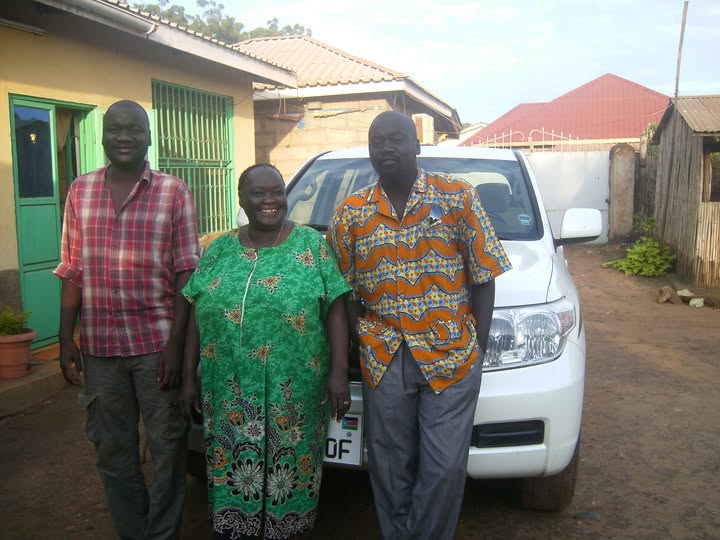 Dani, Mama Hawa and Labanese standing together