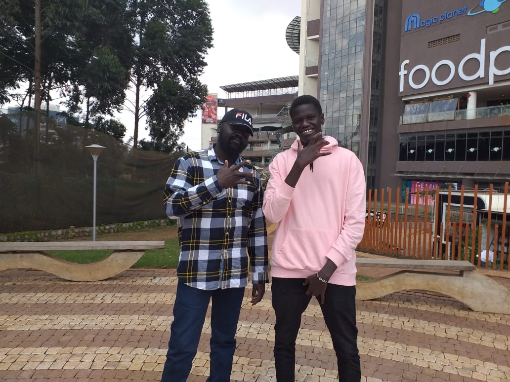 Labana and Libo standing together during a family outing