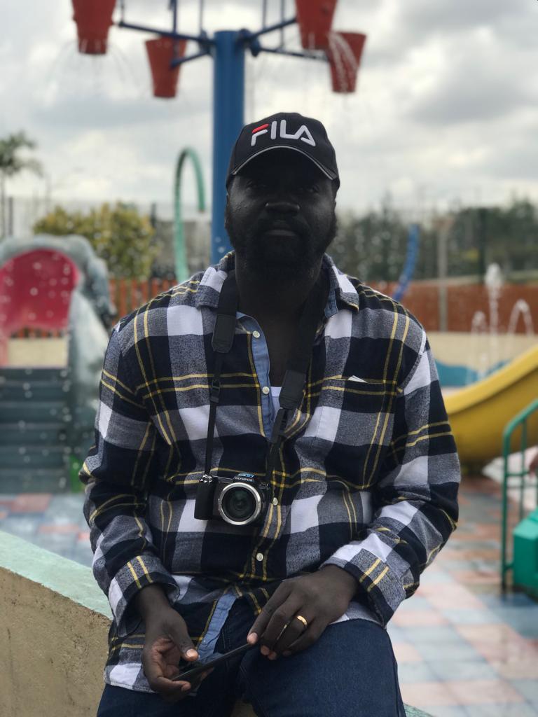 Labana with a camera during a family outing in Nairobi