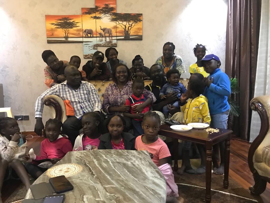 Labana surrounded by nephews, nieces and other family members